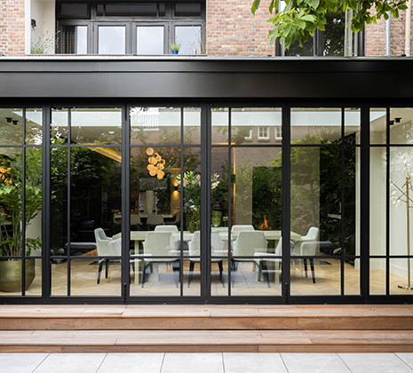 Solarlux Ecoline folding wall in black with rods for luxury home in Amsterdam