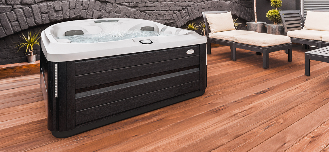 Jacuzzi J-435 spa on the garden terrace for luxurious outdoor wellness