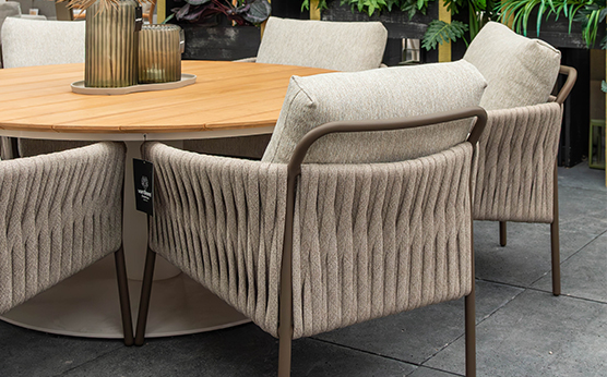 Suns Fiave dining chair in bronze-finished aluminum for a luxurious garden and patio