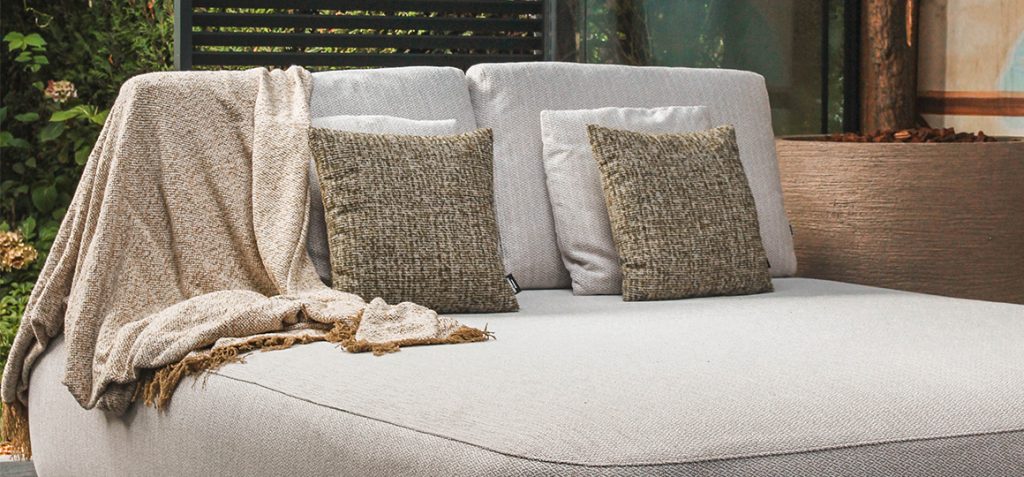 Green decorative pillows and throws for luxury garden furniture and outdoor spaces