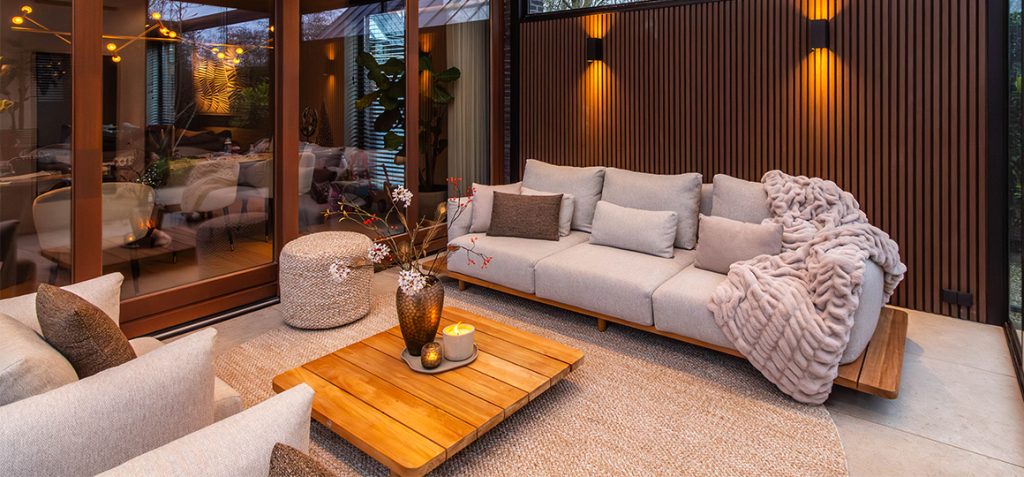 Suns Bora teak sofa set under a canopy for a luxurious garden and patio