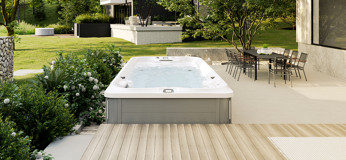Jacuzzi J-19 PowerPro swim spa in Brushed Grey for luxurious wellness and swimming in the backyard